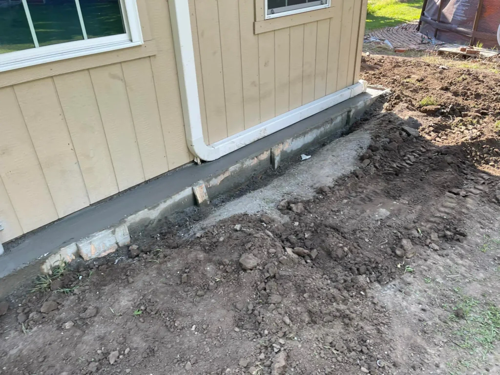 Rock Famous Foundation Repair completing concrete services in Tulsa
